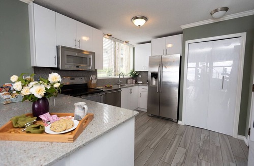 North Oyster Condo | Beach Bliss oceanfront king suite! Stunning view, patio, dock, pool & hot tub!