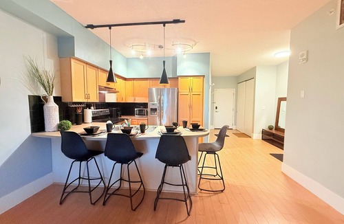 Downtown Calgary Apartment | Exec Riverfront 1BR, steps from the river and vibrant downtown. pet-friendly
