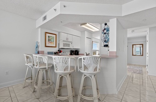 Seawinds Condo Condo | Pet friendly, direct oceanfront corner 2/2 with spacious balcony and heated beachfront pool