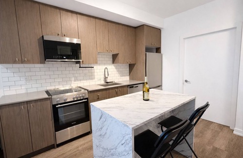 Kitchener Condo | Stylish Oasis Condo | Gym, Bowling, Pool, Hot Tub
