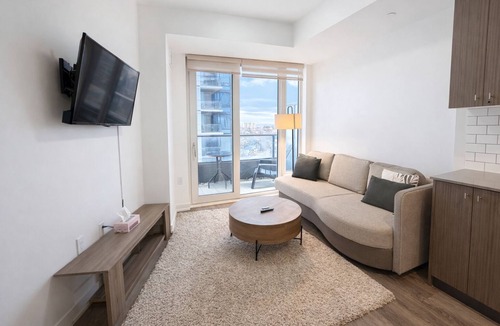Kitchener Condo | Stylish Oasis Condo | Gym, Bowling, Pool, Hot Tub