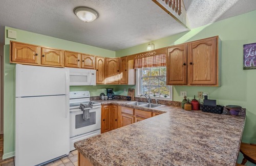 Great Cacapon House | Trails End - riverside | pets | hot tub | wifi | fire pit | grill