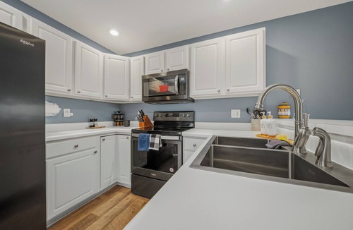 Kaiser Condo | Updated Lakefront Condo 2/2, Amazing Views, Location, Pool, Waterfront Patio!
