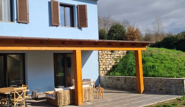 Blue villa surrounded by greenery between Arezzo Florence and Siena