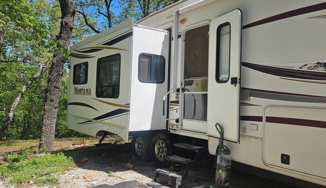 Camper 3 just 1.5 miles from Stockton Lake High point boat ramp. At Fair Play MO