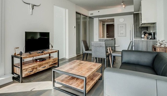 Downtown 2BR Gem with Balcony and Skyline Views