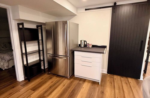 Aurora House | Bright Walk-Out Suite with Private Entrance, Parking & Backyard …